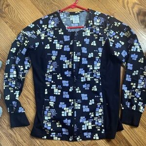 Cherokee slimming scrub jacket. Zip close 2 side pockets. SzS